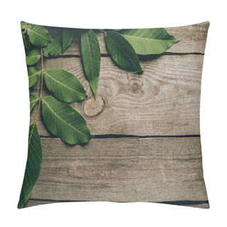 Personality  Top View Of Beautiful Green Walnut Leaves On Wooden Table  Pillow Covers