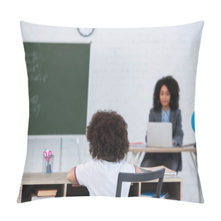 Personality  African American Schoolgirl Sitting Near Stationery And Blurred Teacher  Pillow Covers