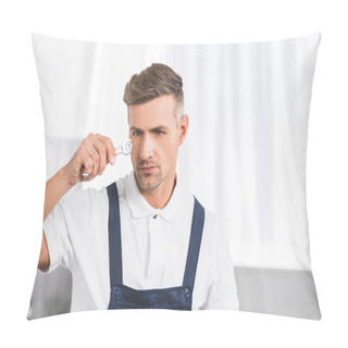 Personality  Thoughtful Adult Repairman Holding And Looking At Wrench With Screw Pillow Covers