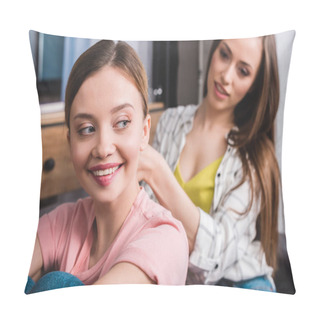 Personality  Smiling Woman Hairdressing Female Friend By Hair Straightener On Sofa At Home Pillow Covers