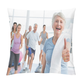 Personality  Senior Woman Gesturing Thumbs Up With People Exercising Pillow Covers