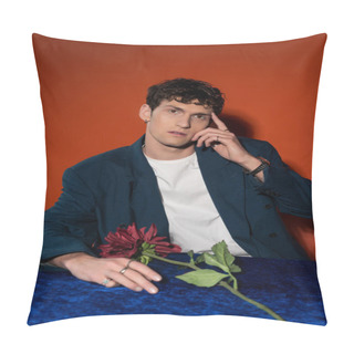 Personality  Stylish Man Touching Forehead Near Burgundy Dahlia Flower On Red Background Pillow Covers