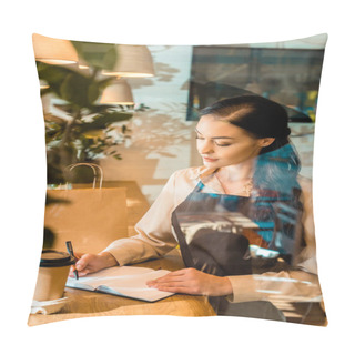 Personality  View Through Glass Of Attractive Waitress In Apron Writing Something To Notebook In Cafe Pillow Covers