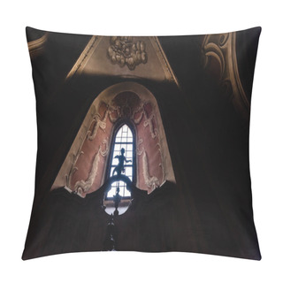 Personality  LVIV, UKRAINE - OCTOBER 23, 2019: Statue Of Angel Near Window With Decoration In Lviv Latin Cathedral Pillow Covers