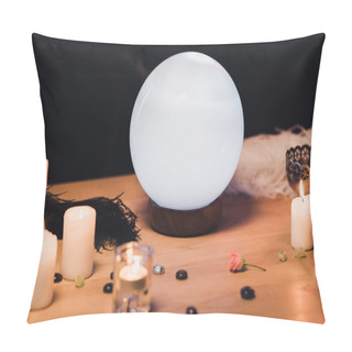Personality  Crystal Ball Near Candles And Feathers On Wooden Table Isolated On Black  Pillow Covers