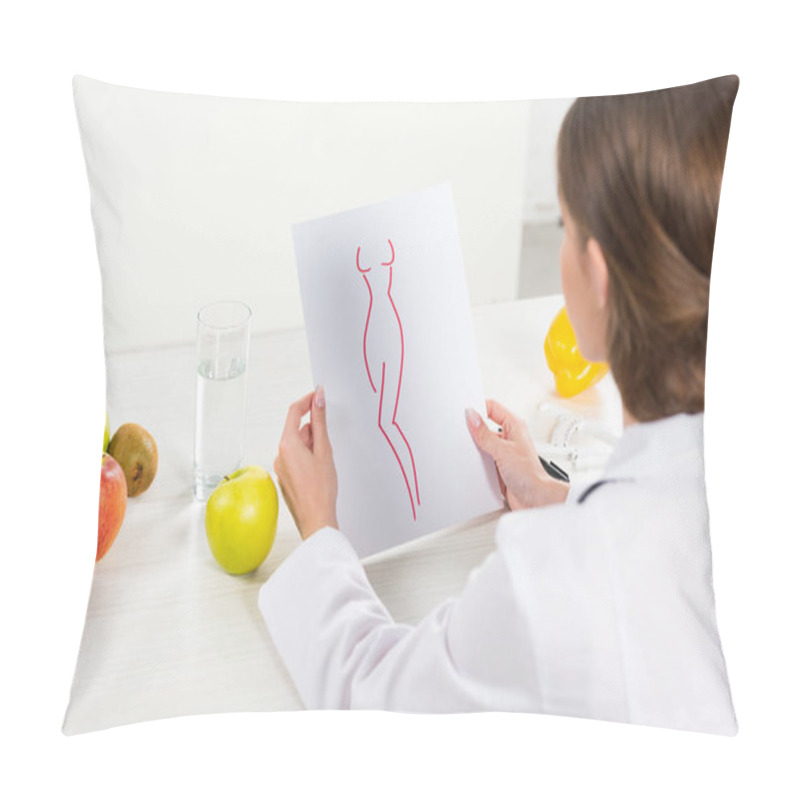 Personality  Cropped View Of Dietitian In White Coat Holding Paper With Perfect Body Image At Workplace Pillow Covers