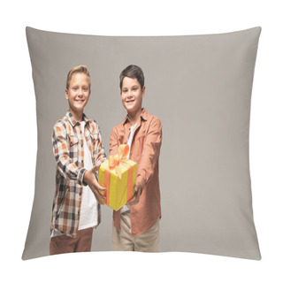Personality  Two Happy Brothers Showing Yellow Gift Box Isolated On Grey Pillow Covers