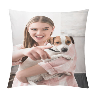 Personality  Happy Woman Holding In Arms Jack Russell Terrier And Pointing With Finger In Living Room  Pillow Covers