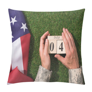 Personality  Cropped Shot Of Soldier In Military Uniform Holding Calendar With 4th July Date With American Flag On Green Grass, Americas Independence Day Concept Pillow Covers