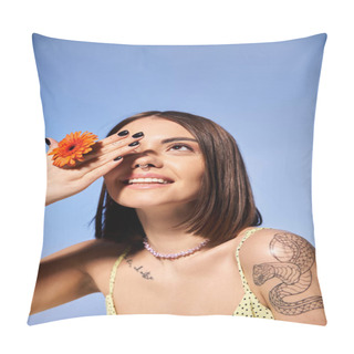 Personality  A Young Woman With Brunette Hair Delicately Holds A Blooming Flower In A Serene Studio Setting. Pillow Covers