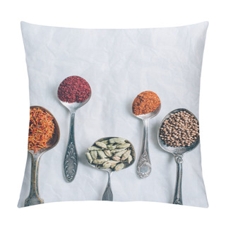 Personality  Elevated View Of Different Spices In Spoons On White Table Pillow Covers
