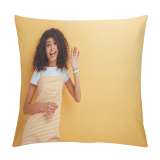 Personality  Happy Mixed-race Girl Waving Hand While Looking At Camera On Yellow Background Pillow Covers