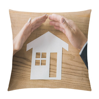 Personality  Partial View Of Business People Covering House Paper Model On Wooden Tabletop With Hands, Insurance Concept Pillow Covers