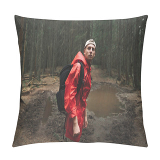 Personality  Portrait Of A Male Hiker In A Red Jacket Feeling Calm And Relaxed In The Fir Forest. Young Tourist Man Backpacker With Serious Facial Expression Is In The Mountain Woods, Puddle On The Background. Pillow Covers