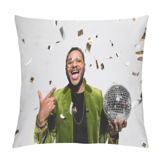 Personality  Amazed Indian Hip Hop Performer In Green Velvet Blazer And Crown Holding Disco Ball Near Falling Confetti On Grey Pillow Covers