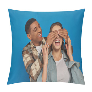 Personality  Excited African American Man Covering Eyes Of Woman With Open Mouth On Blue Background, Peekaboo Pillow Covers