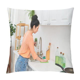 Personality  A Woman In Casual Attire Stands At A Kitchen Sink, With A Pan On The Counter. She Appears Focused And Serene As She Carries Out Her Household Chores. Pillow Covers
