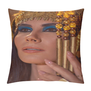 Personality  Portrait Of Elegant Woman With Bold Makeup And Egyptian Headdress Holding Flail Isolated On Brown Pillow Covers