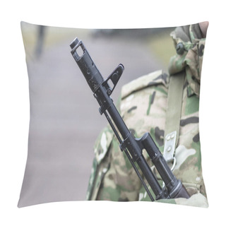 Personality  Close-up, Kalashnikov Assault Rifle, On The Chest Of A Military Man. There Is A Tint Pillow Covers