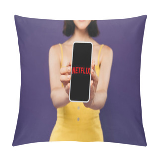Personality  KYIV, UKRAINE - JULY 3, 2019: Selective Focus Of Smiling Girl Presenting Smartphone With Netflix App Isolated On Purple  Pillow Covers