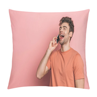 Personality  Cheerful Young Man Laughing While Talking On Smartphone On Pink Background Pillow Covers