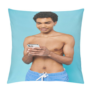 Personality  Appealing Jolly African American Man In Blue Swimming Trunks Looking At Phone On Blue Backdrop Pillow Covers