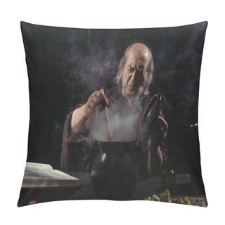 Personality  Senior Alchemist Frowning Near Steaming Pot While Cooking At Night On Black Background Pillow Covers