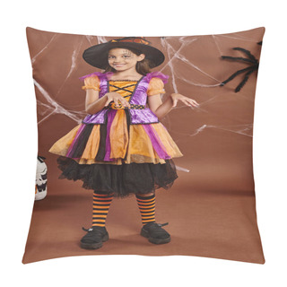 Personality  Cheerful Girl In Witch Hat And Dress Dancing Near Bucket With Sweets On Brown, Halloween Concept Pillow Covers