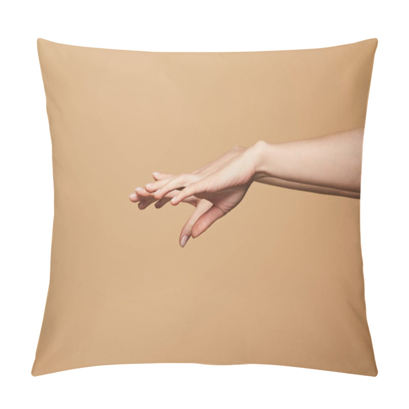 Personality  cropped view of female delicate hands isolated on beige pillow covers