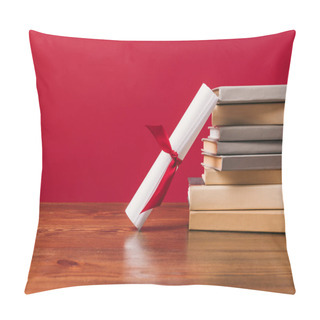 Personality  Diploma And Stack Of Different Books On Red Pillow Covers