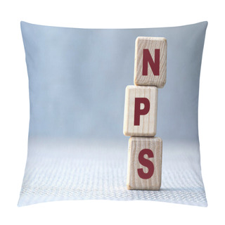 Personality  Concept Word NPS (Net Promoter Score) On Wooden Cubes On A Gray Background. Business Concept Pillow Covers