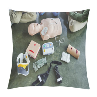 Personality  Cropped View Of Multiethnic Participants Of First Aid Seminar Near CPR Manikin, Defibrillator, Wound Care Simulators, Bandages, Compression Tourniquets And Neck Brace In Training Room, Top View Pillow Covers