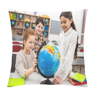 Personality  Three Cheerful Pupils Playing With Globe In Classroom During Geography Lesson Pillow Covers