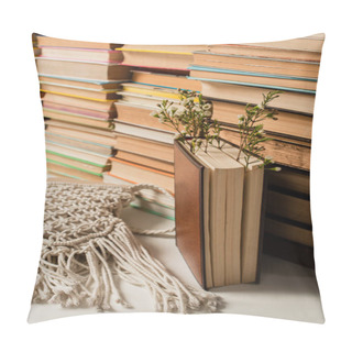 Personality  Wildflowers Near Blurred Pile Of Books With Hardcover And Knitted Crossbody Bag On White Pillow Covers
