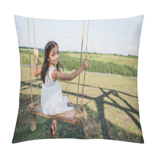 Personality  Girl In White Dress Riding Swing And Looking At Camera In Meadow Pillow Covers