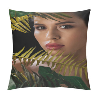 Personality  Portrait Of Beautiful Woman Looking At Camera Across Green Leaves Isolated On Black Pillow Covers