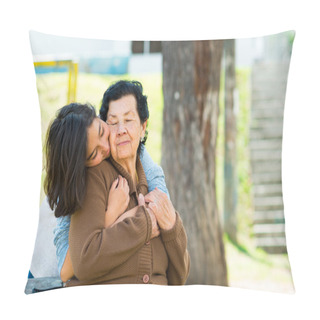 Personality  Young Girl Standing Behind Grandmother Hugging And Embracing In Outdoors Environment Pillow Covers