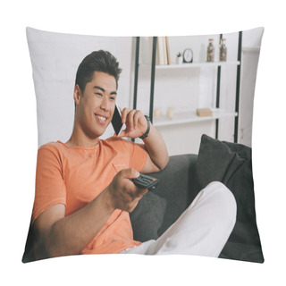 Personality  Handsome Asian Man Talking On Smartphone And Watching Tv While Sitting On Sofa At Home Pillow Covers