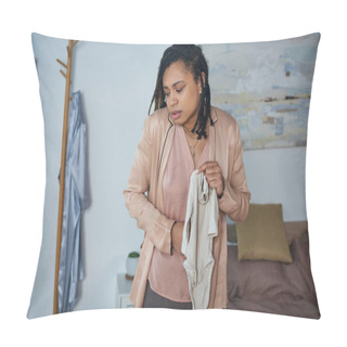 Personality  Upset African American Woman Holding Baby Clothes, Sitting On Bed, Emotional, Miscarriage Concept Pillow Covers