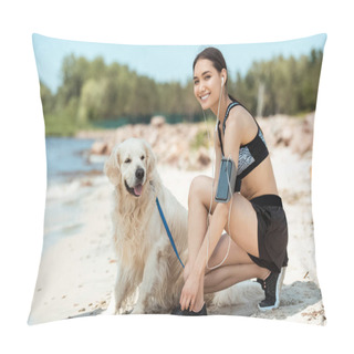 Personality  Smiling Asian Sportswoman In Earphones With Smartphone In Running Armband Case Tying Shoelaces Near Golden Retriever On Beach  Pillow Covers