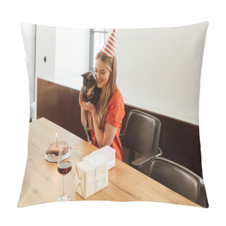 Personality  Happy Girl In Party Cap Holding In Arms Cat And Looking At Birthday Cake Near Presents And Red Wine In Glass Pillow Covers