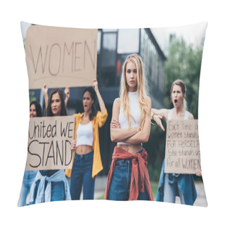 Personality  Serious Woman Standing With Arms Crossed Near Women Holding Placards With Feminist Slogans On Street Pillow Covers