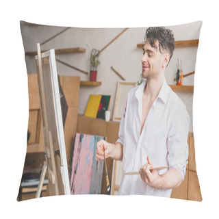 Personality  Selective Focus Of Smiling Artist In White Shirt And Blue Jeans Looking At Canvas Pillow Covers