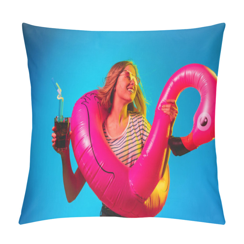 Personality  Beautiful woman in neon light isolated on blue studio background pillow covers