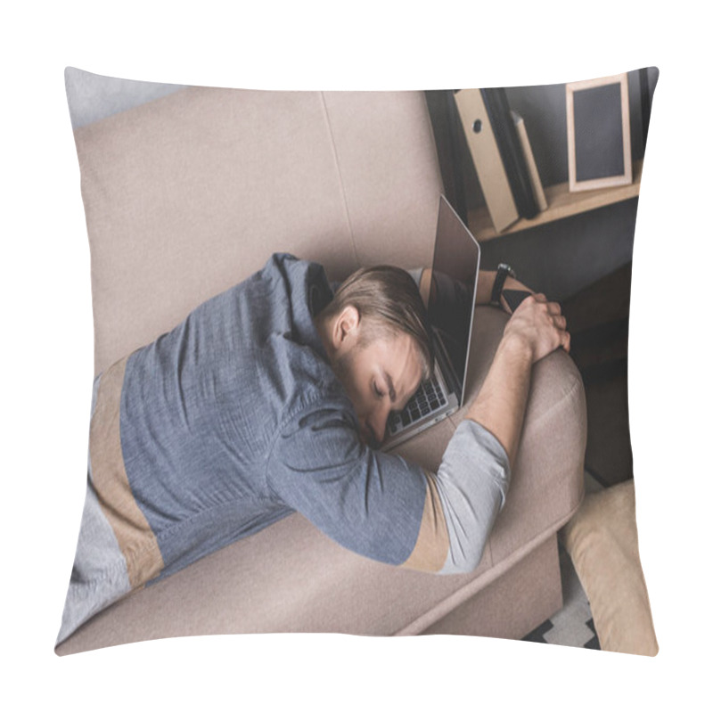 Personality  young overworked businessman sleeping on couch with head lying on laptop pillow covers