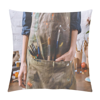 Personality  Cropped Image Of Artist With Brushes And Hand In Apron Pocket Pillow Covers