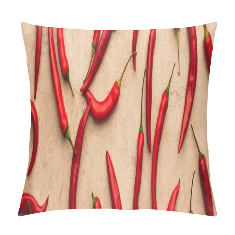 Personality  top view of scattered chili peppers on beige concrete surface, panoramic shot pillow covers
