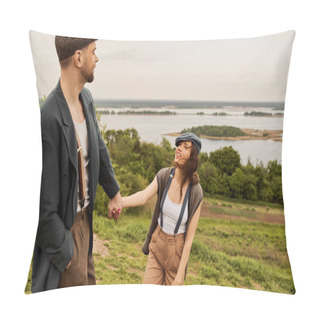 Personality  Cheerful And Fashionable Brunette Woman In Newsboy Cap And Suspenders Holding Hand Of Bearded Boyfriend In Jacket And Standing With Scenic Landscape At Background, Fashionable Couple In Countryside Pillow Covers