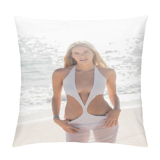 Personality  A Young Blonde Woman Stands On A Sandy Beach, Gazing At The Ocean, Under A Clear Blue Sky On A Sunny Day. Pillow Covers