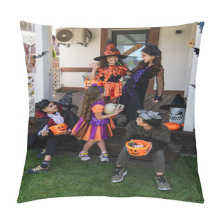 Personality  Cheerful Girl Showing Scary Gesture Near Multiethnic Friends In Halloween Costumes Pillow Covers